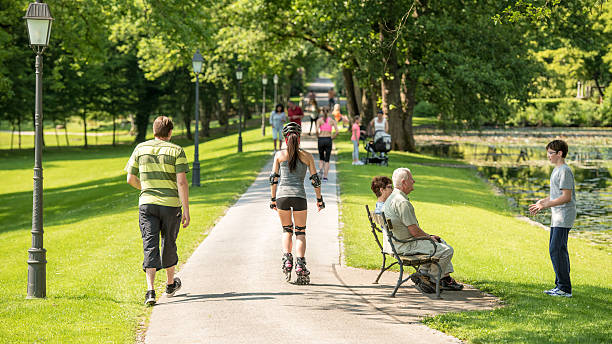 People walking in a park on a sunny day